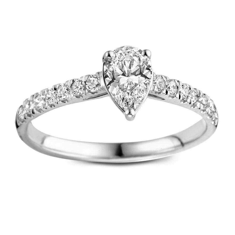 Anillo de oro blanco con diamante en forma de pera y brillantes en el aro.