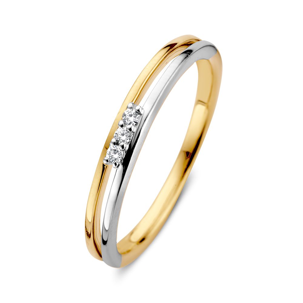 Anillo bicolor de oro de 14 quilates con tres diamantes en el centro.