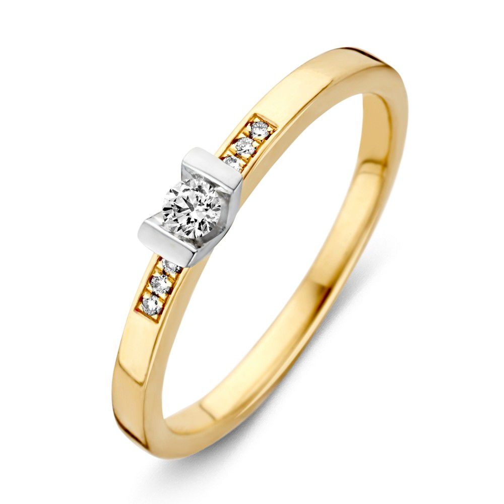 Anillo de dama bicolor de 14 quilates con diamantes brillantes engastados.