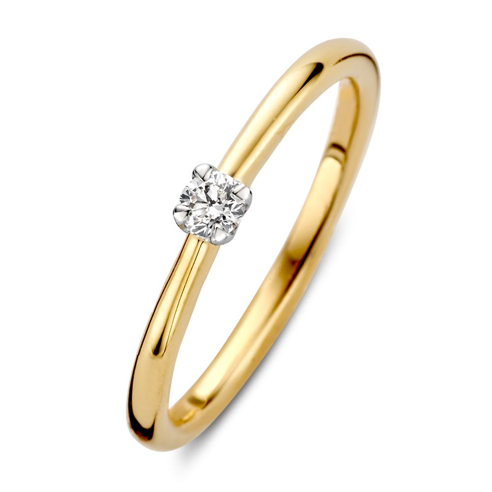 Anillo solitario bicolor de oro amarillo y blanco de 14 quilates con engaste en tulipán y diamante.