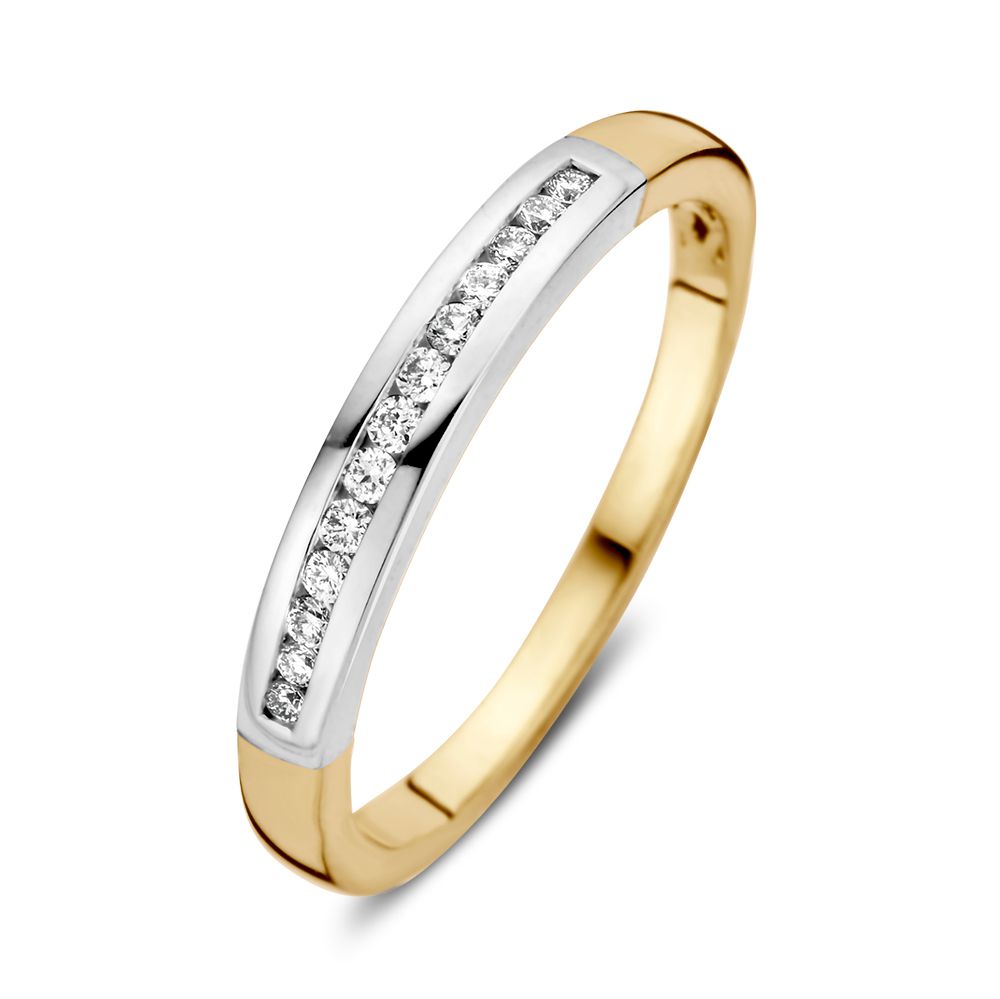 Anillo bicolor de oro amarillo y blanco con diamantes de 0.12 ct.