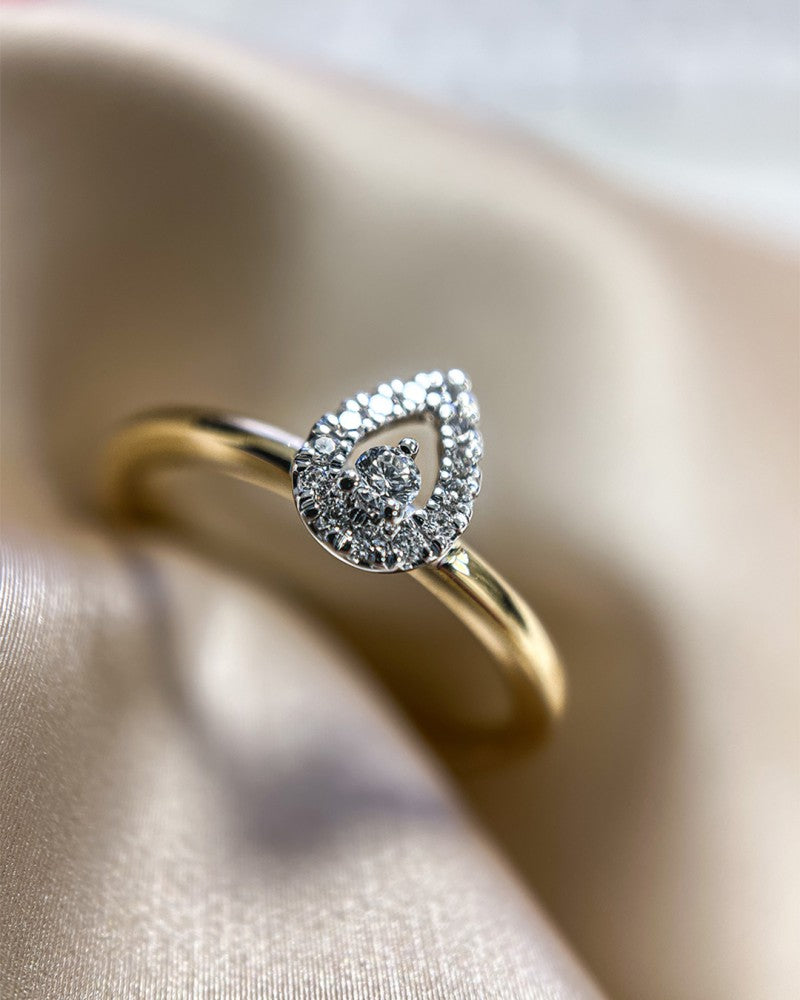 Anillo de mujer bicolor en oro amarillo y oro blanco con 0.12 crt diamante, 14 quilates