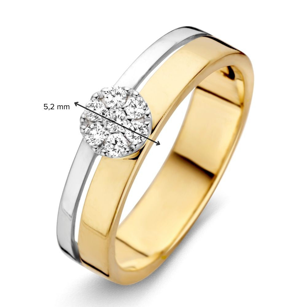 Anillo de diseño crossover en oro amarillo y oro blanco con diamantes brillantes