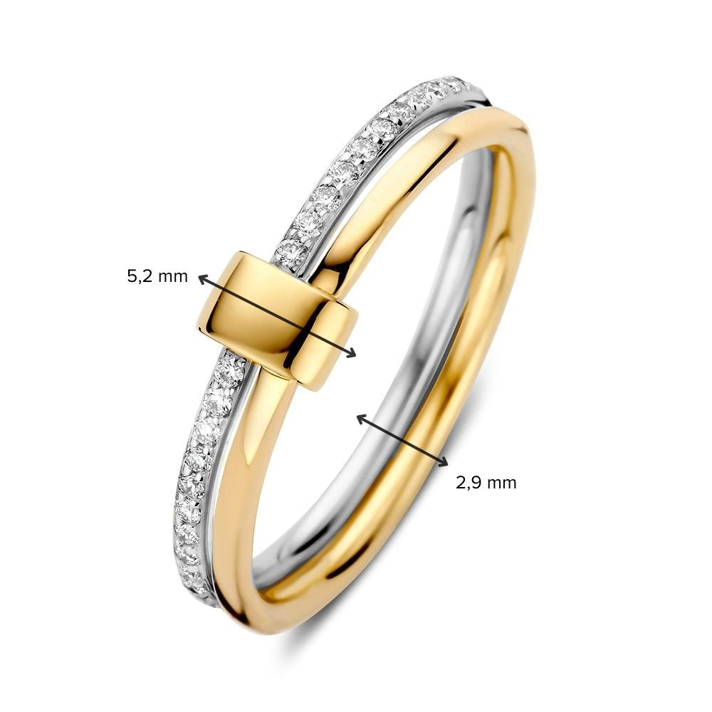 Anillo bicolor de 14kt oro amarillo y oro blanco con 0.14ct diamantes
