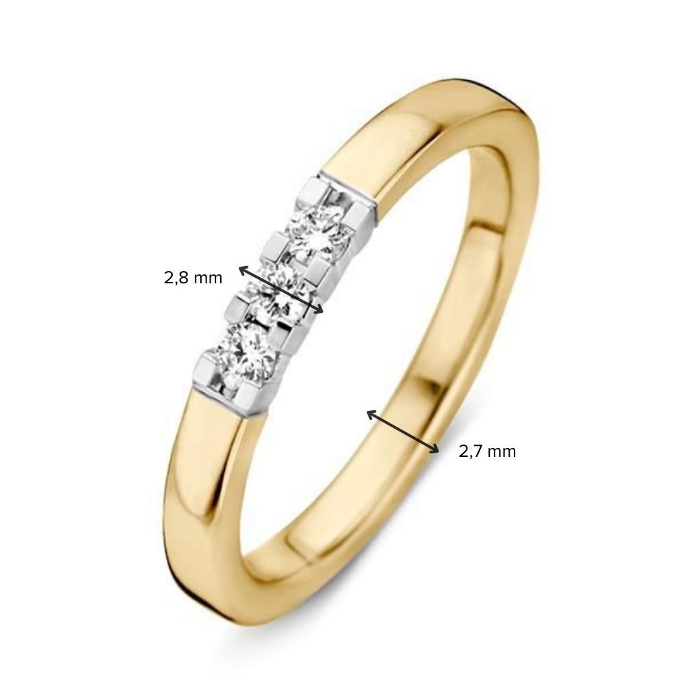 Anillo de mujer bicolor de oro blanco y oro amarillo con tres diamantes de 0.15 crt.