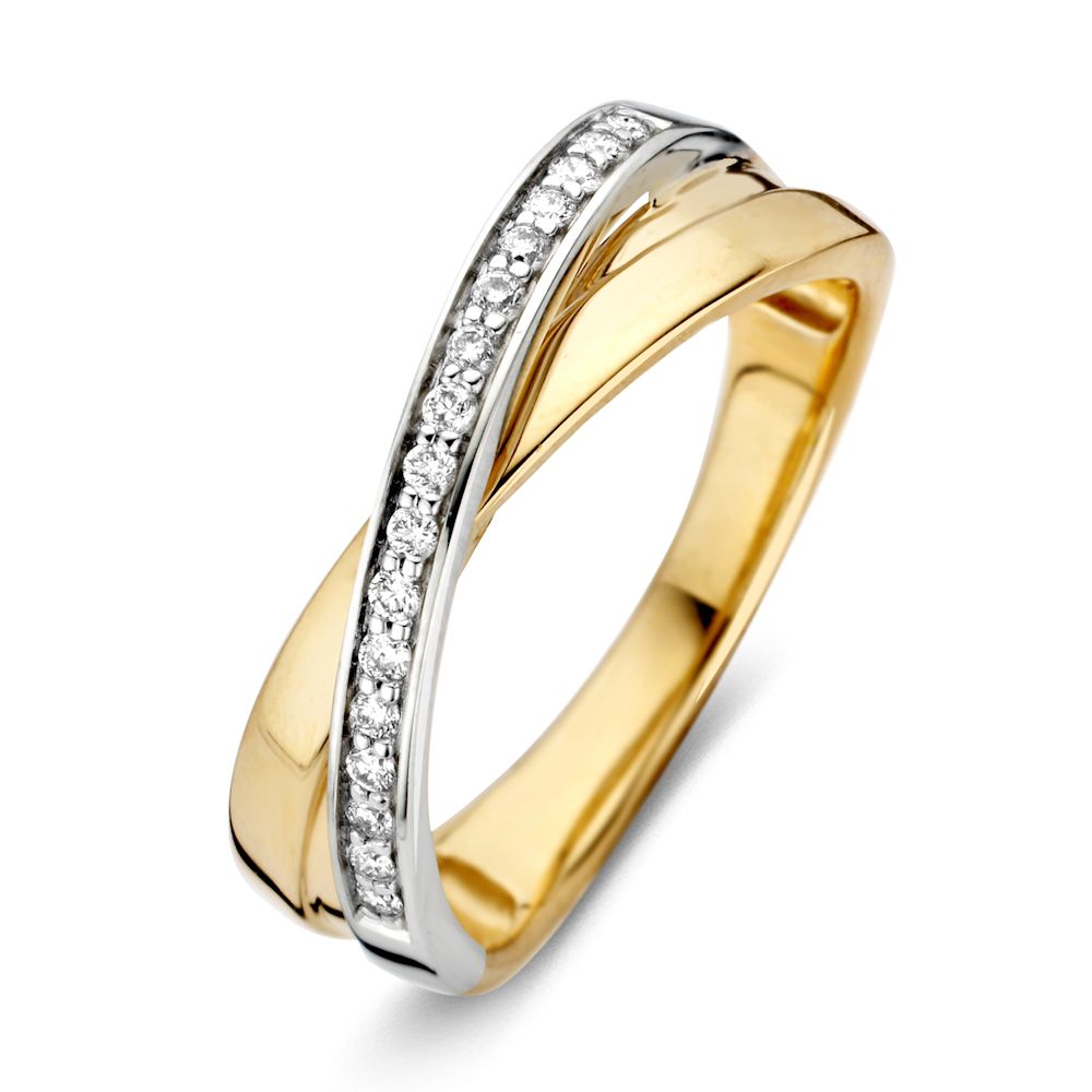 Anillo de dama en oro amarillo y blanco con diamante brillante de 0.16 ct.