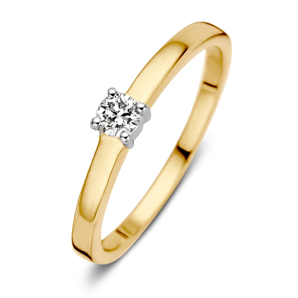 Anillo de dama bicolor en oro amarillo y blanco con un diamante brillante de 0.16 ct.