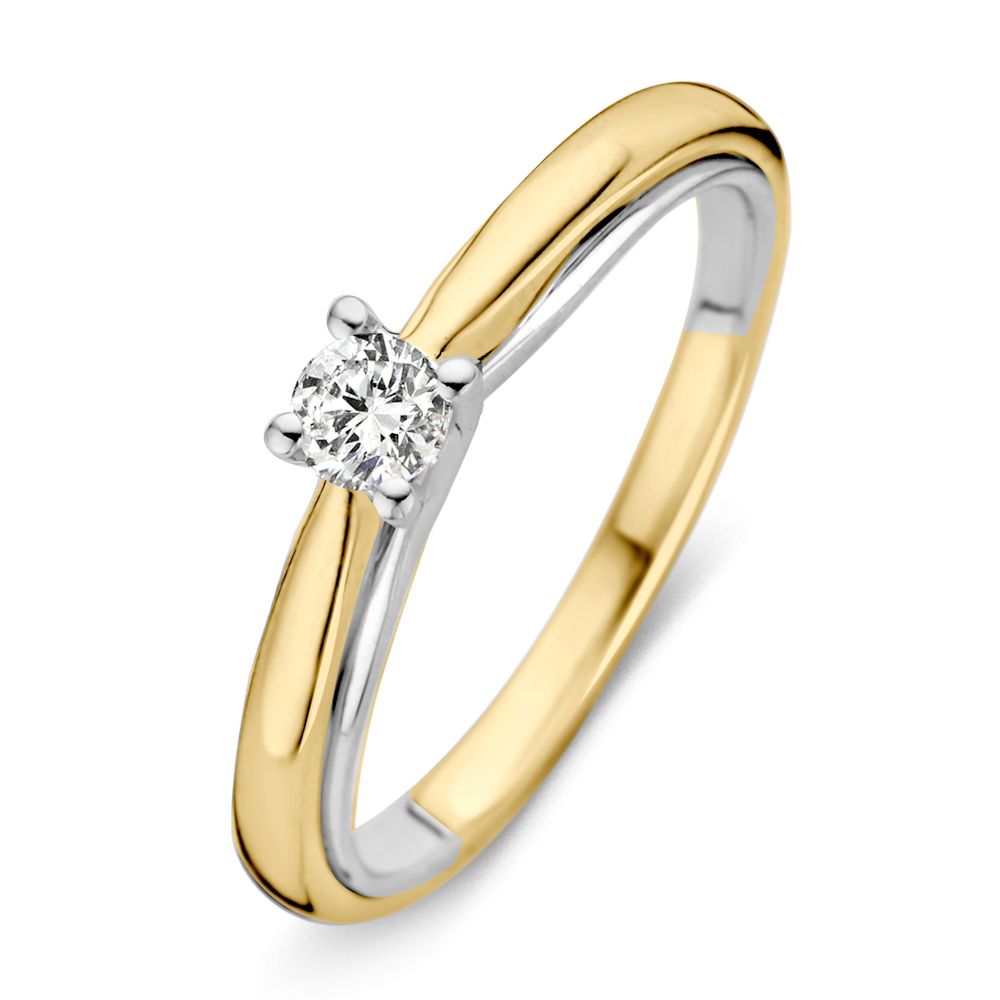Anillo bicolor de oro amarillo y blanco con un brillante de 0.19 crt.