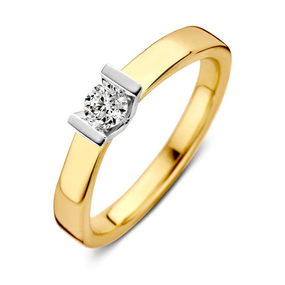 Anillo bicolor de oro con brillante de 0.20 quilates.