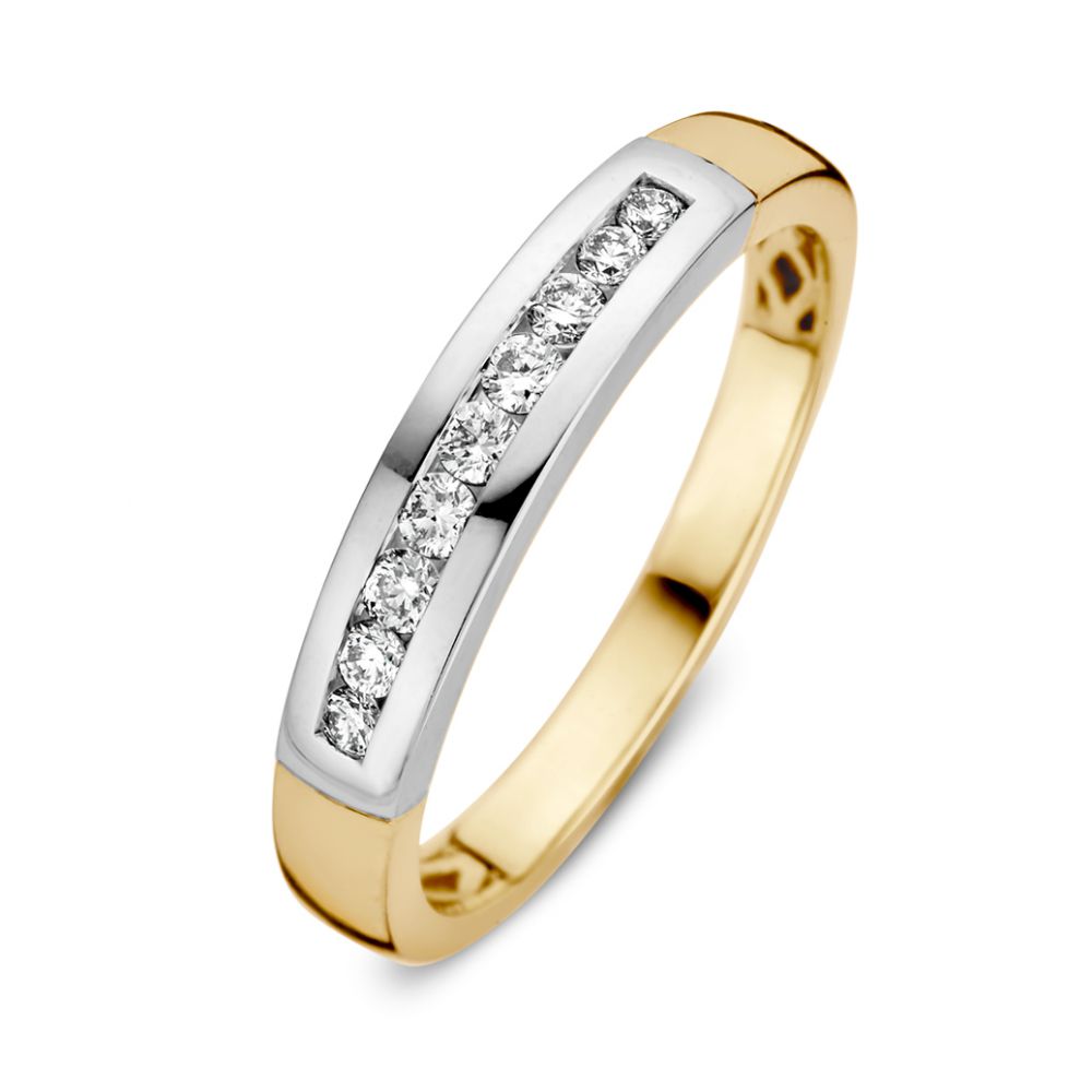 Anillo bicolor de oro con diamantes en engaste de riel, 0.20 quilates.