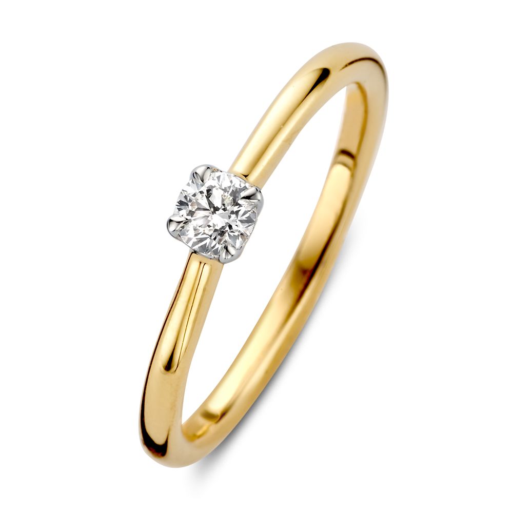 Anillo solitario bicolor de oro con brillante de 0.20 quilates.