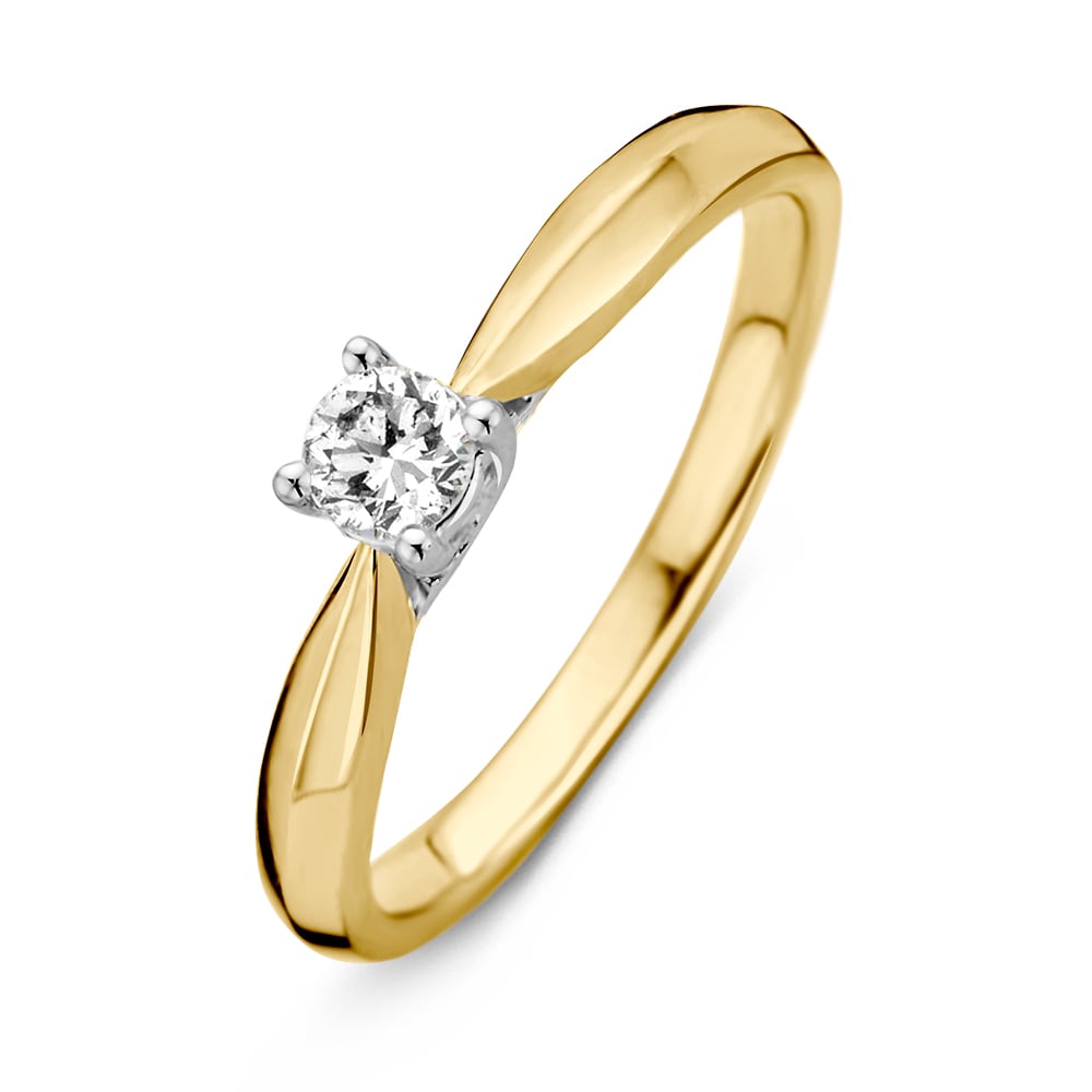 Anillo bicolor de oro amarillo y blanco con diamante de 0,24 ct.