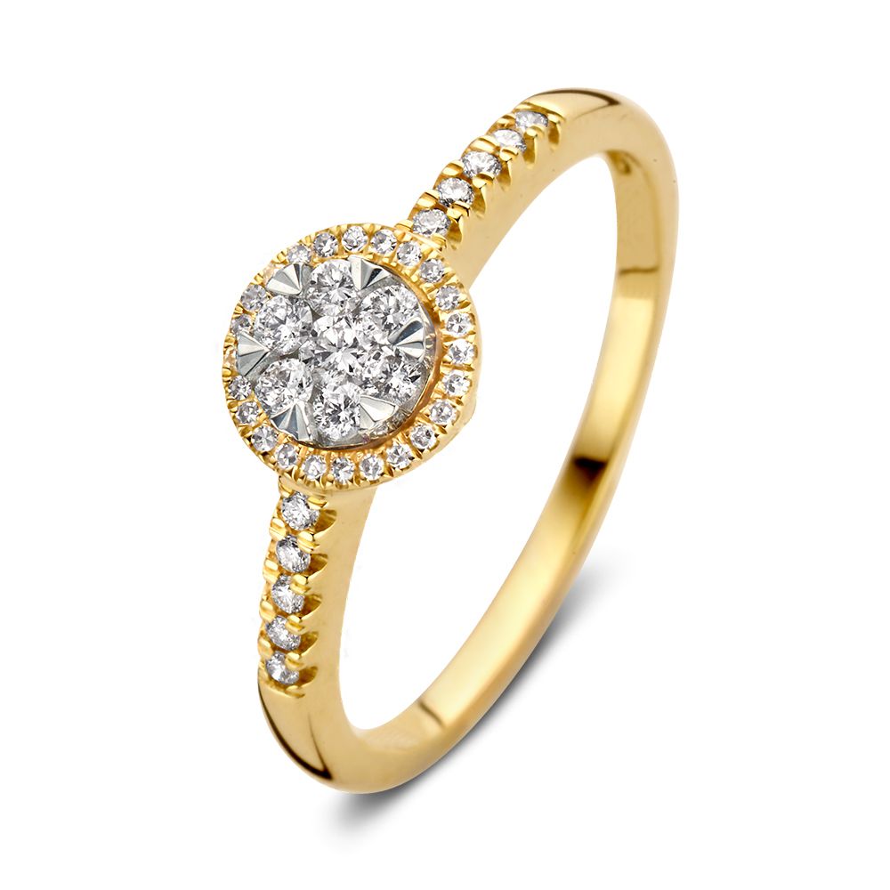 Anillo bicolor de diamantes para dama en oro amarillo y blanco de 14 quilates con diamante ovalado de 0.24 ct.