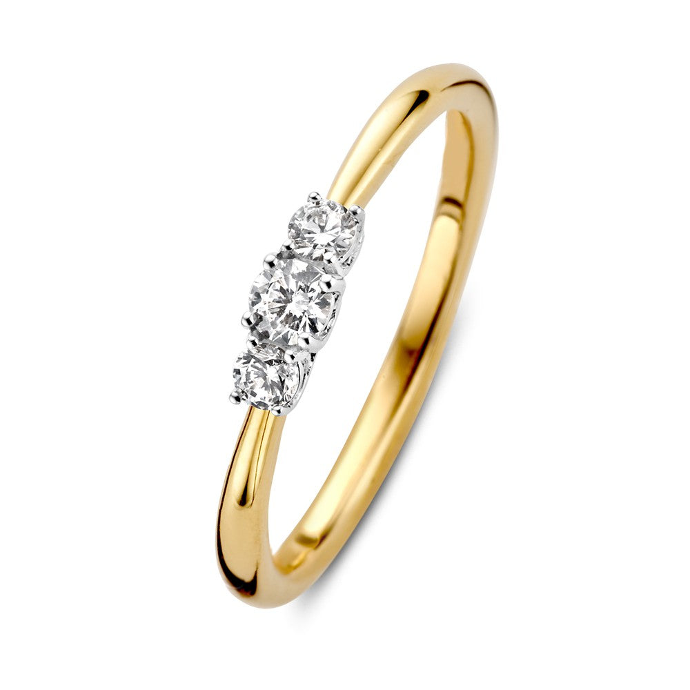 Anillo bicolor elegante con tres diamantes de 0,24 ct en el centro.