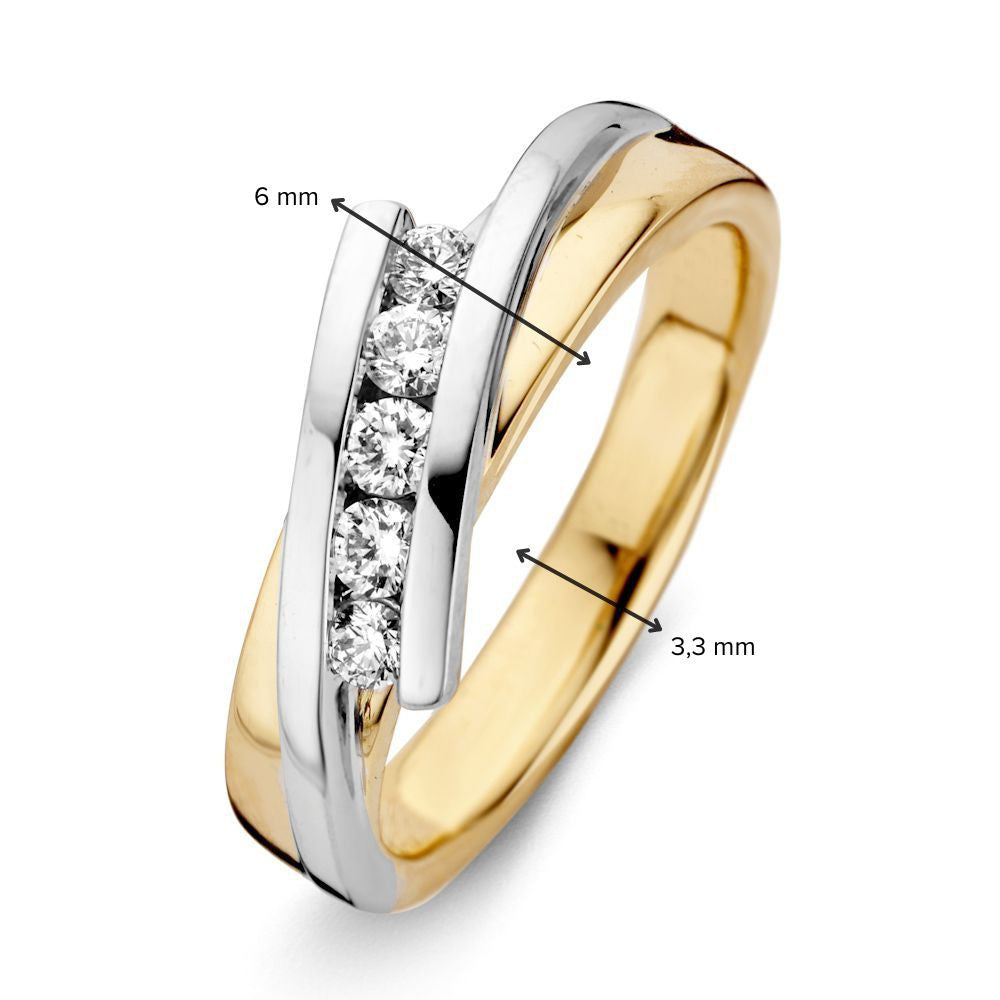 Anillo bicolor de oro amarillo y oro blanco con diamante brillante – 0,24 ct