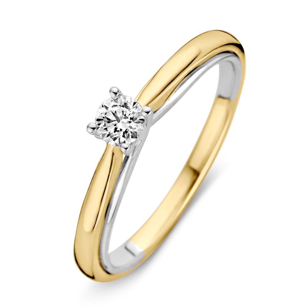Anillo elegante de oro amarillo y blanco con un diamante brillante de 0,25 quilates.