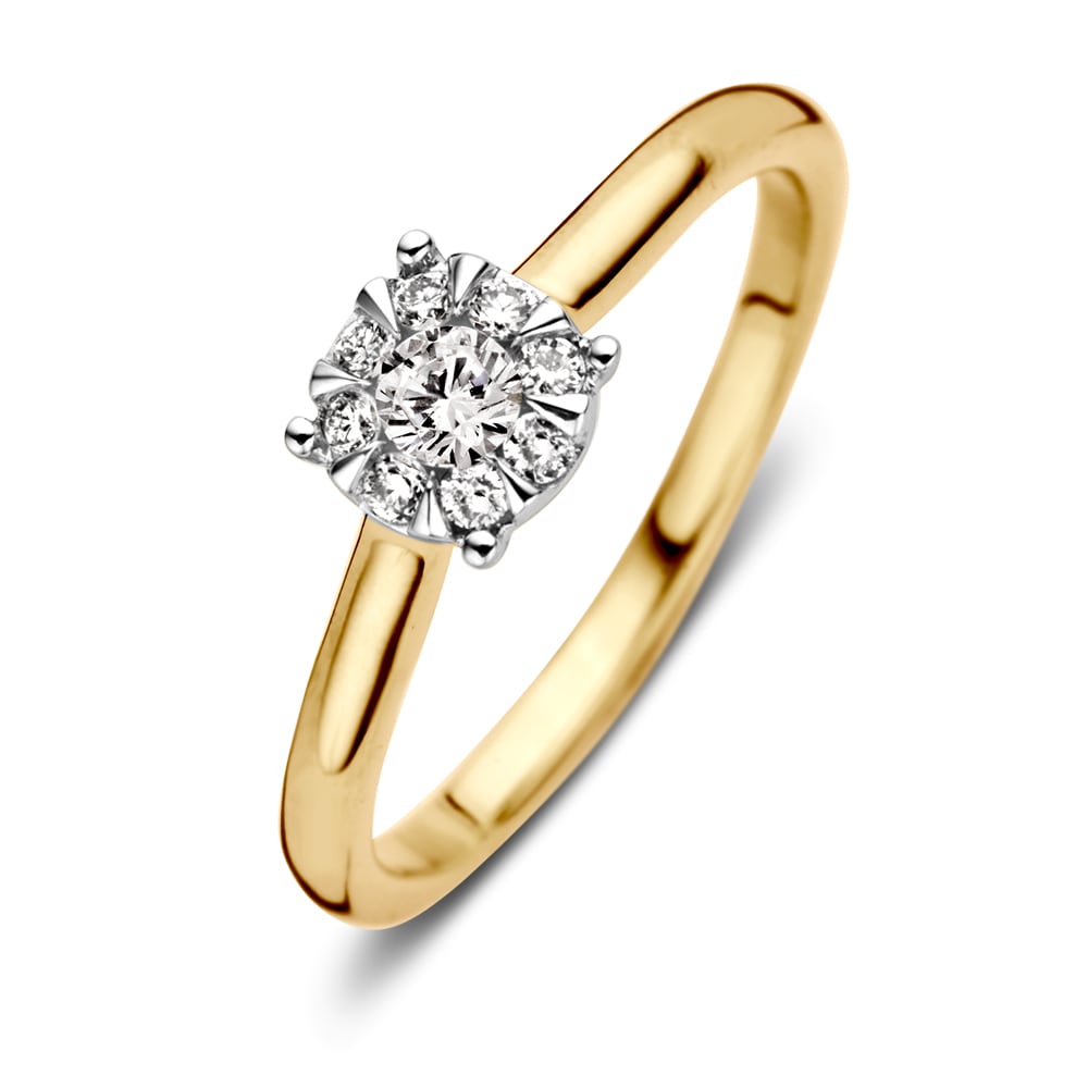 Anillo bicolor de oro amarillo con diamante de 0.25 quilates, con un diseño de entorno.