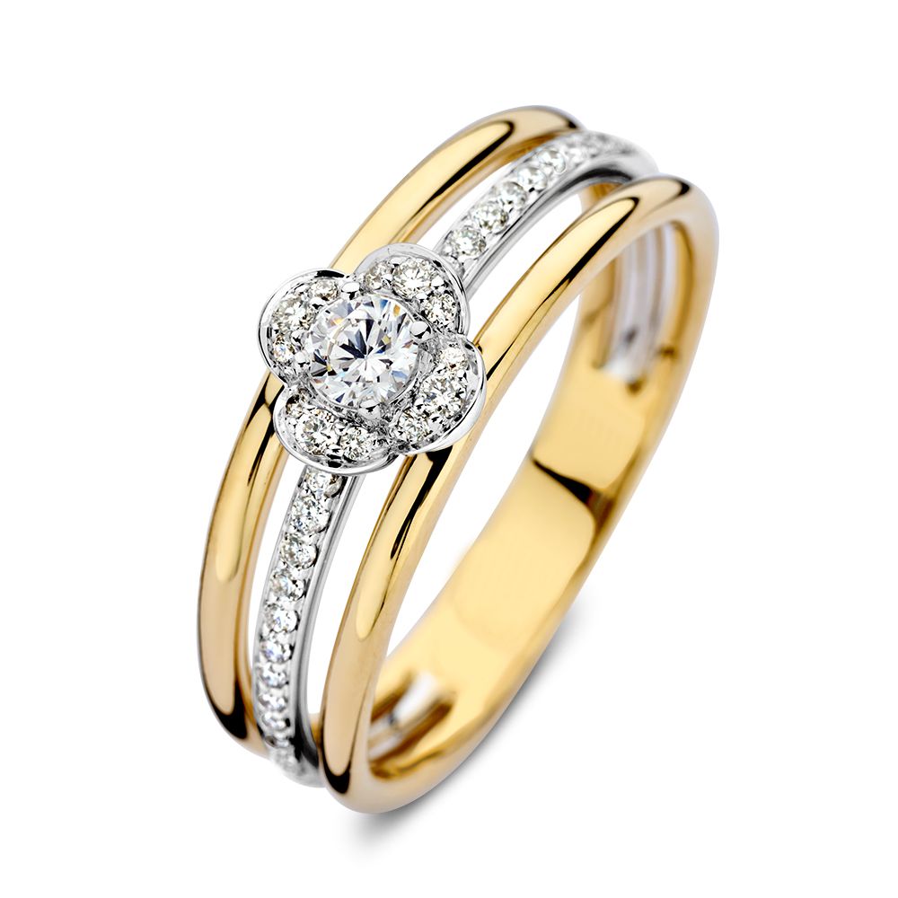 Anillo bicolor de oro amarillo y blanco con engaste de diamantes, 0,28 ct, de 14 quilates.