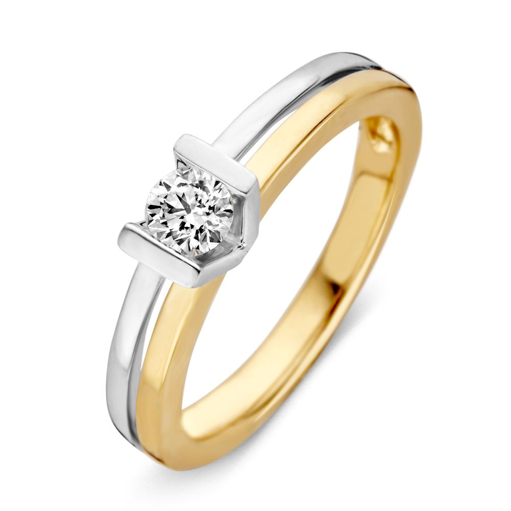 Anillo bicolor de oro amarillo y blanco con diamante de 0,30 ct y diseño moderno, 14 quilates.