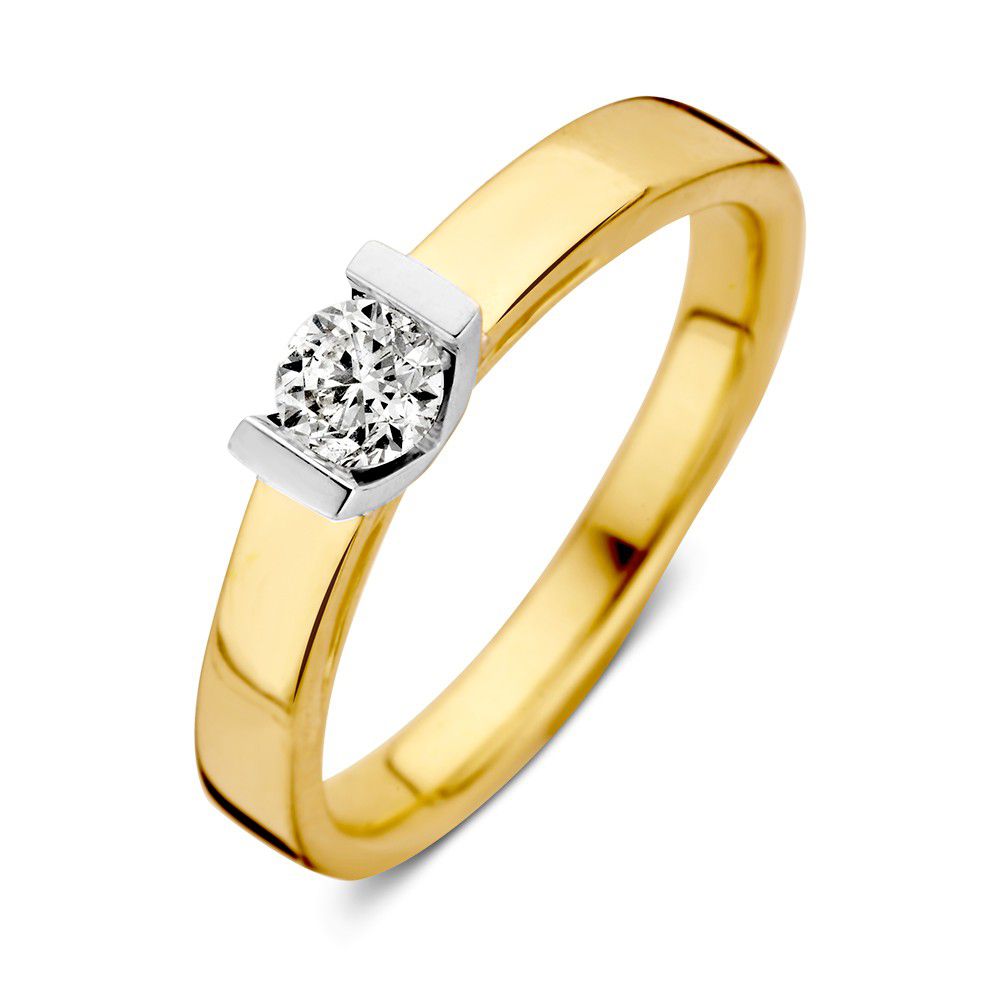 Anillo solitario bicolor de oro blanco y amarillo con piedra central de diamante de 0,30 crt.