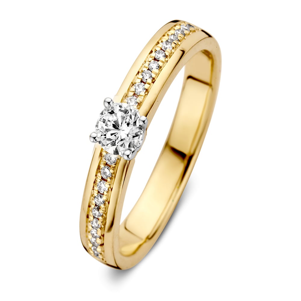 Anillo elegante de oro amarillo con engaste de oro blanco y diamante de 0,30 crt.