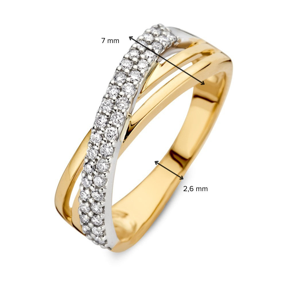 Anillo bicolor de oro blanco y oro amarillo con diamantes 0.30 crt.