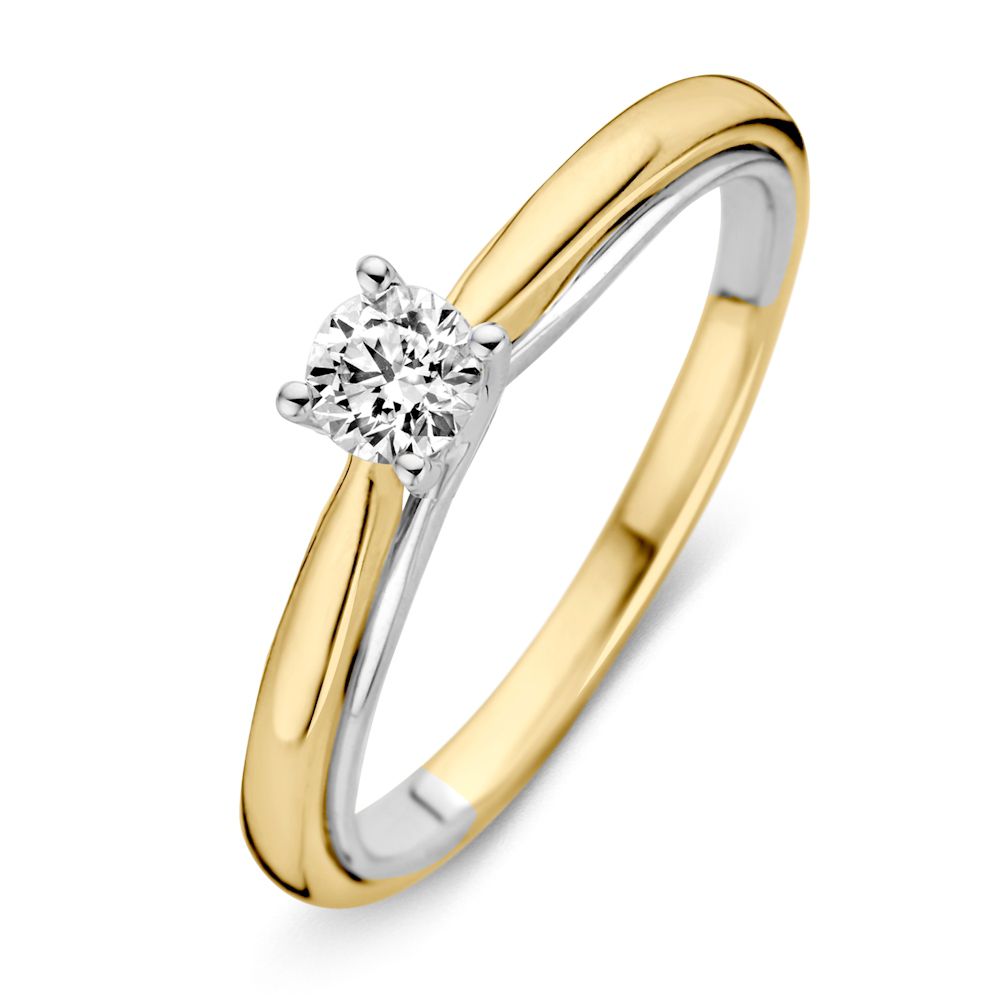 Anillo bicolor de oro amarillo y blanco con diamante brillante de 0.31 crt.