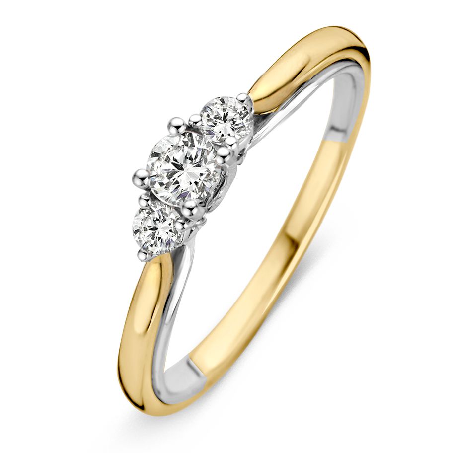 Anillo bicolor de oro amarillo y blanco con diamante brillante de 0.31 crt.