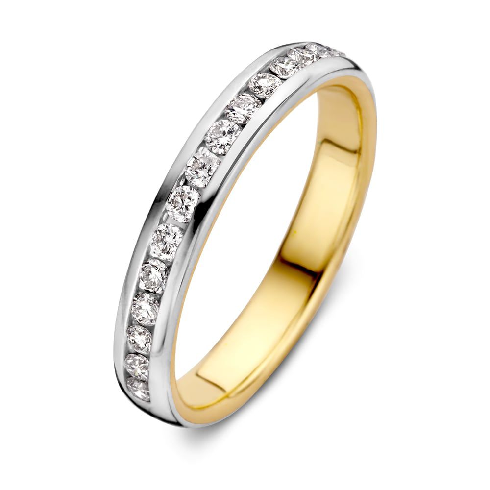 Anillo bicolor de oro blanco y amarillo con diamantes brillantes de 0.32 crt.