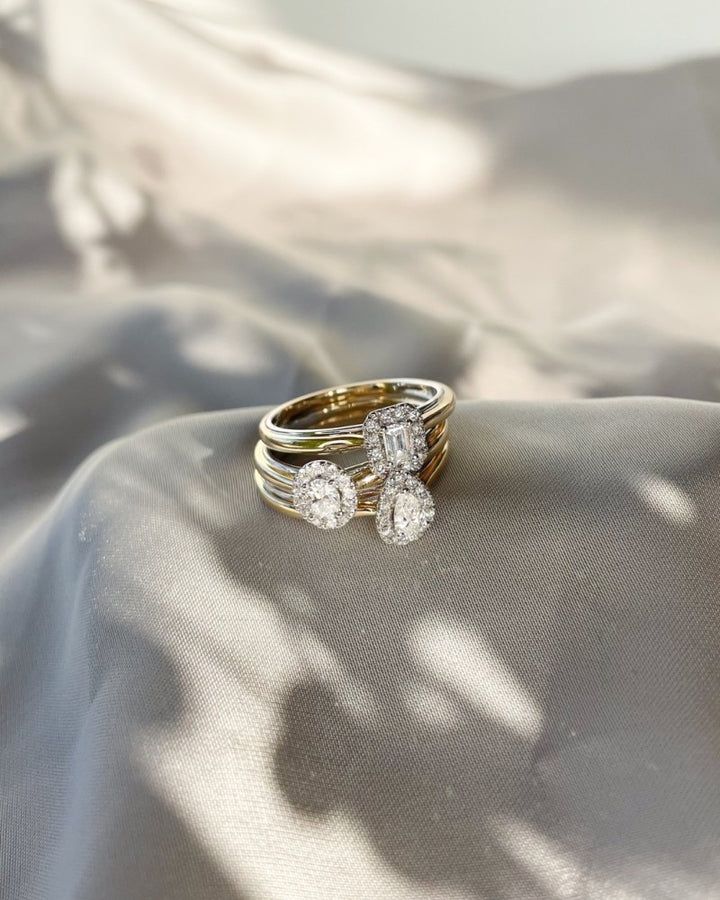 14k Bicolor Gold Ring with Pear-Shaped Diamond in Entourage Setting
