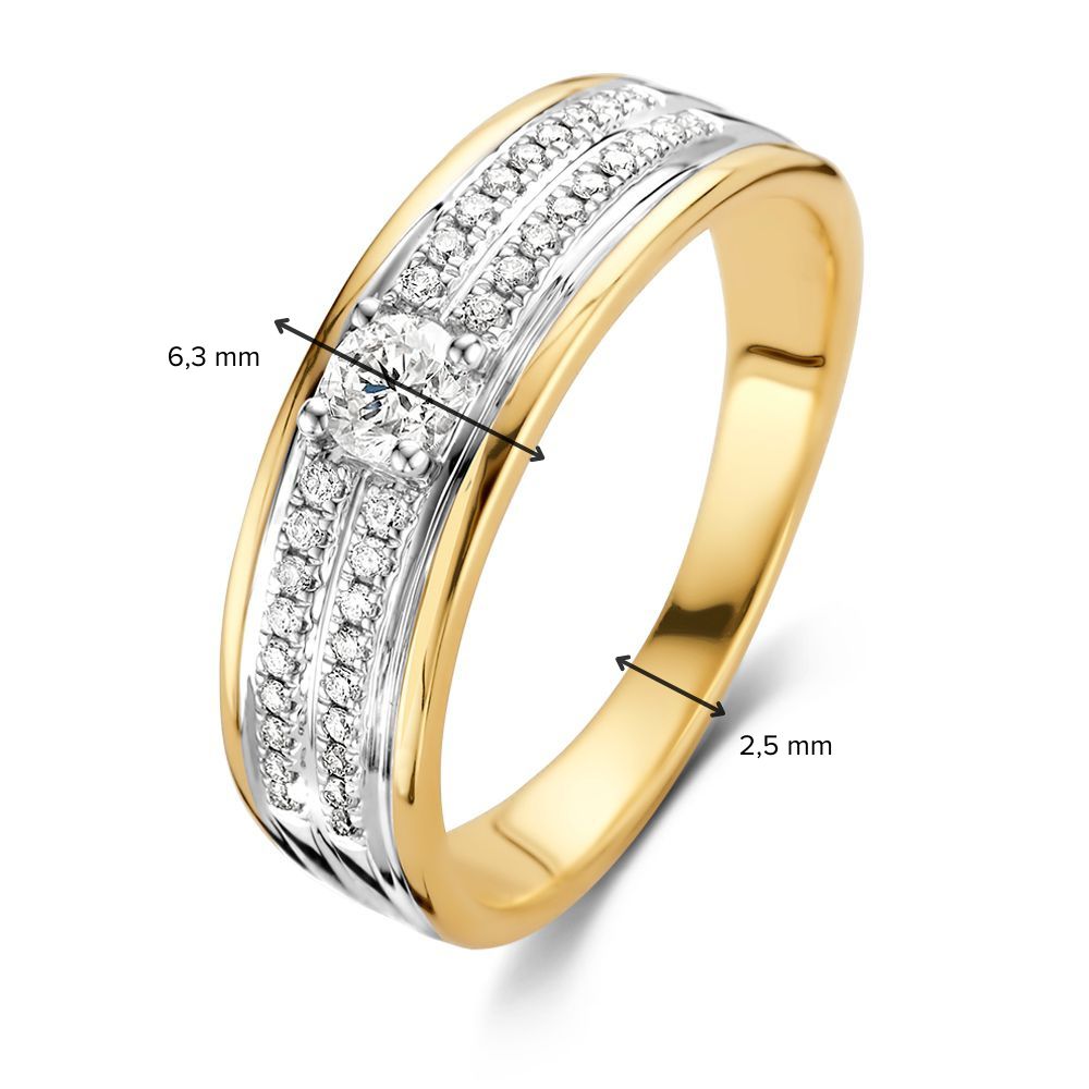 Anillo bicolor elegante de oro con centro de diamante brillante 0.34 crt.