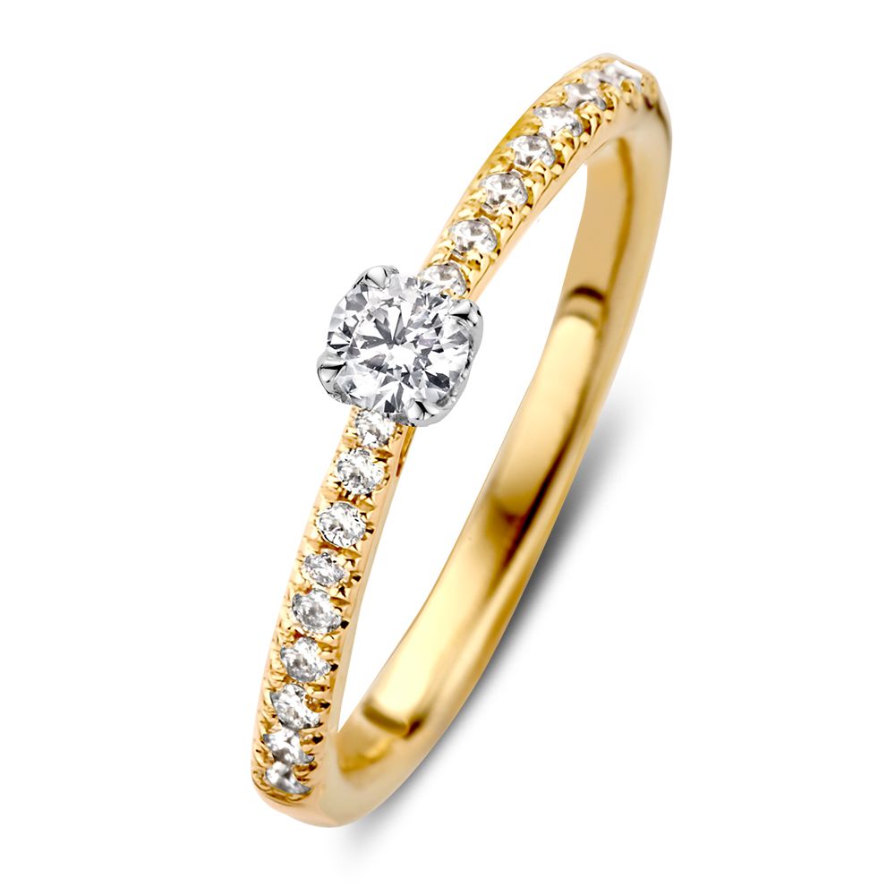 Anillo solitario bicolor elegante con diamante brillante de 0.35 crt y circonitas en el aro.