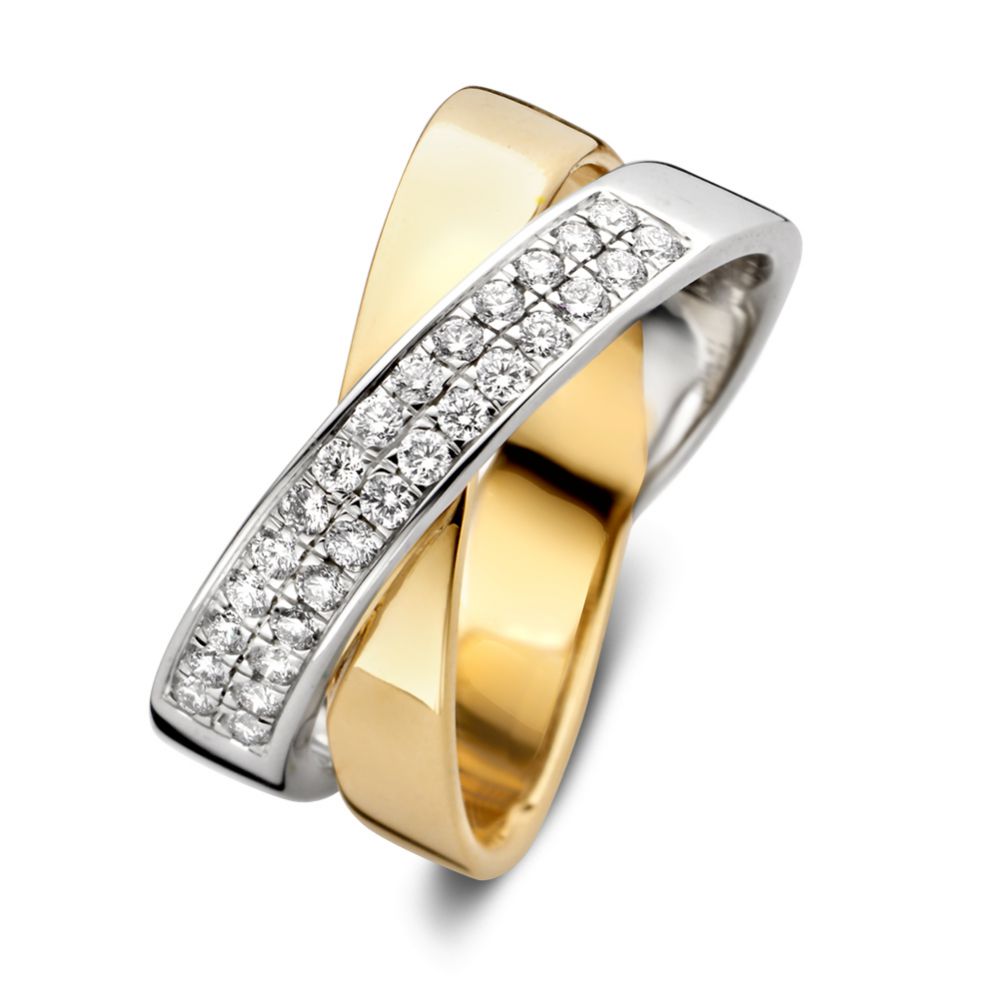 Anillo bicolor con diamantes y piedra central brillante de 0.36 crt.