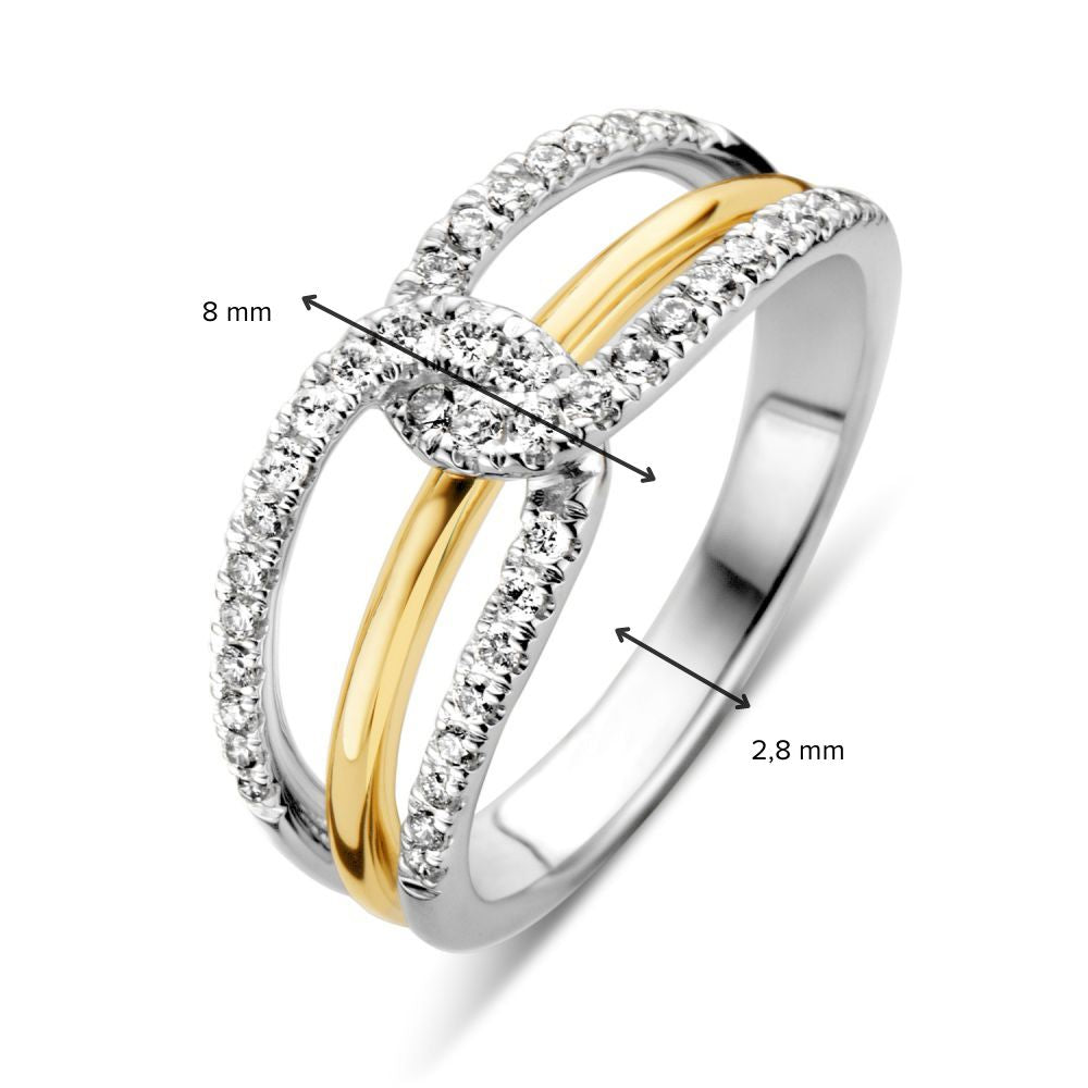 Anillo de mujer bicolor en oro blanco y oro amarillo con brillante – 0.37 crt
