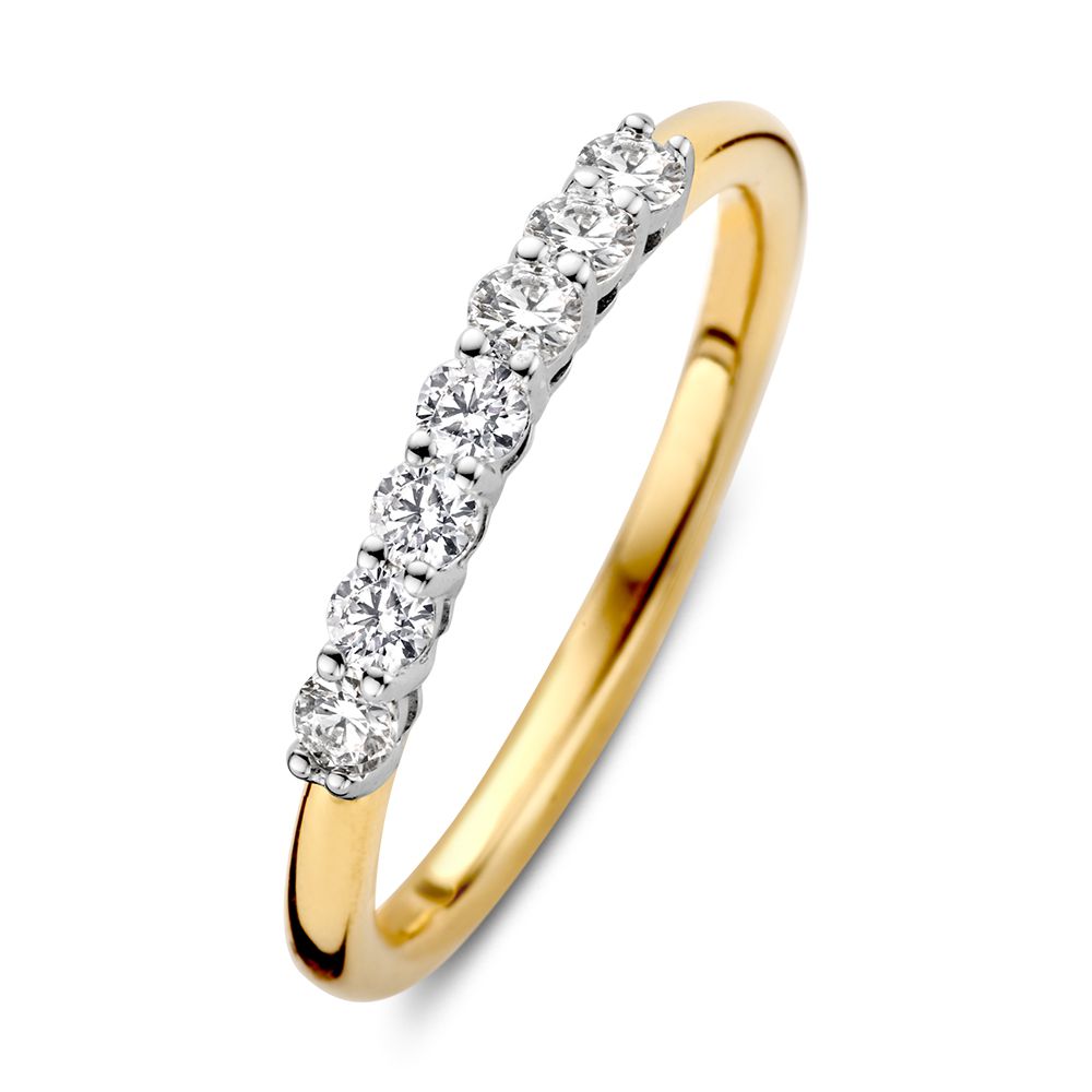 Anillo bicolor de oro de 14 quilates con diamantes (0.40 ct), con una banda dorada y detalles en oro blanco.