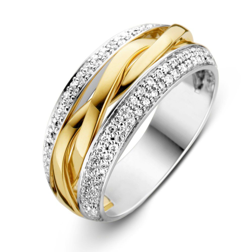 Anillo bicolor de oro amarillo y blanco con diamantes (0.45 crt) de 14 quilates.
