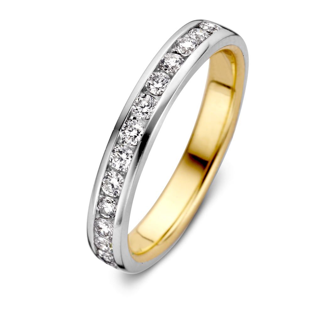 Anillo bicolor de oro blanco y amarillo para dama con diamantes (0.48 crt) y corte brillante.