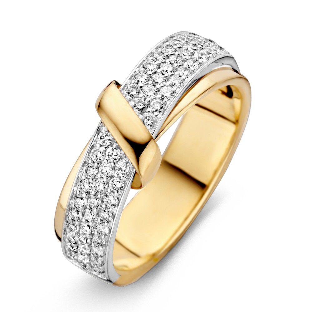Anillo bicolor de oro amarillo y blanco con diamantes (0.49 crt) de 14 quilates.