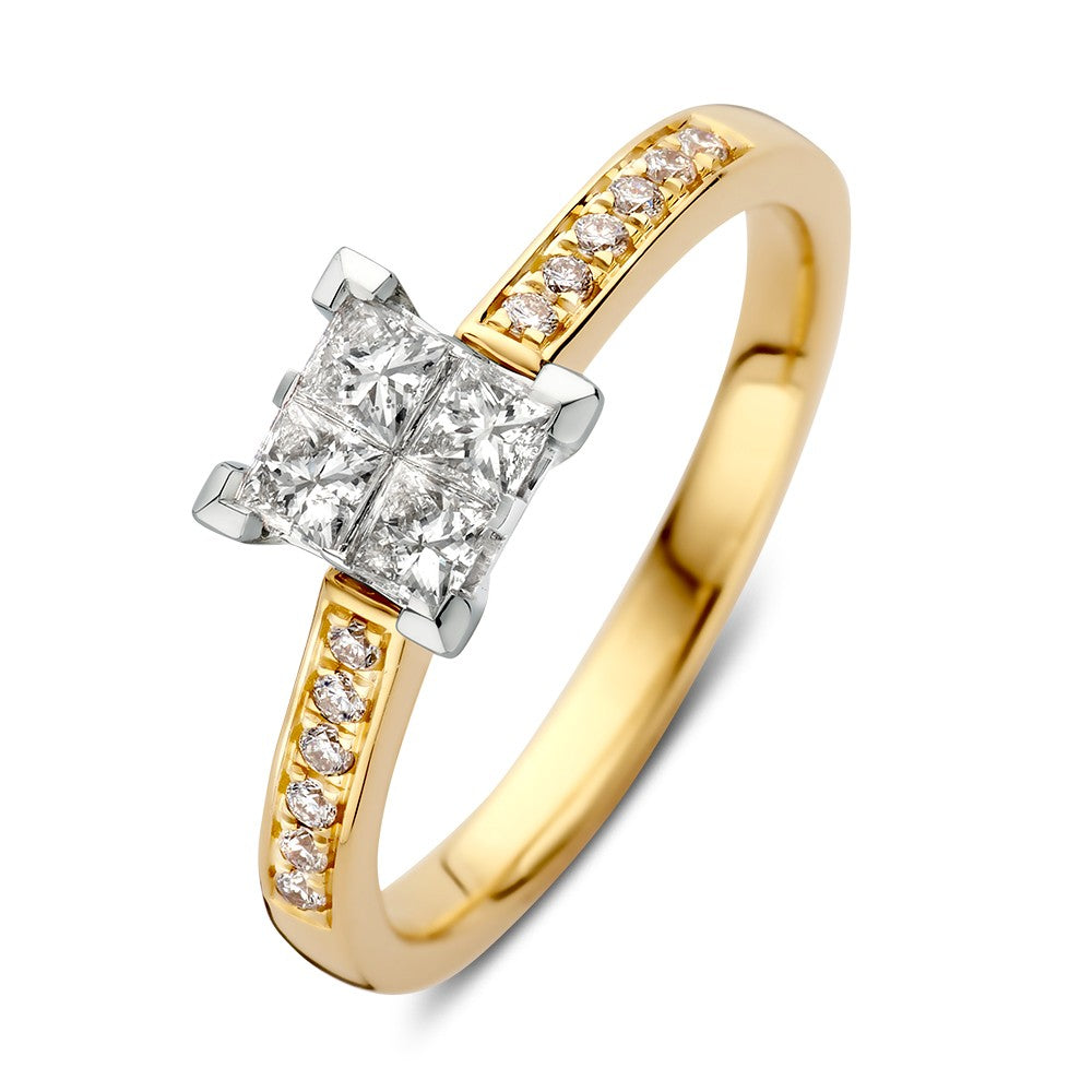 Anillo bicolor con brillantes de 0.50 crt, con detalles en oro amarillo y blanco.