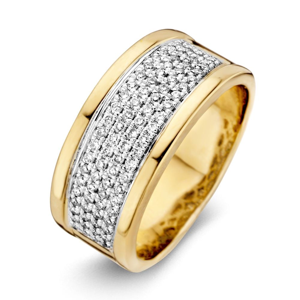 Anillo bicolor de oro amarillo y blanco con diamantes (0.51 crt) de 14 quilates.