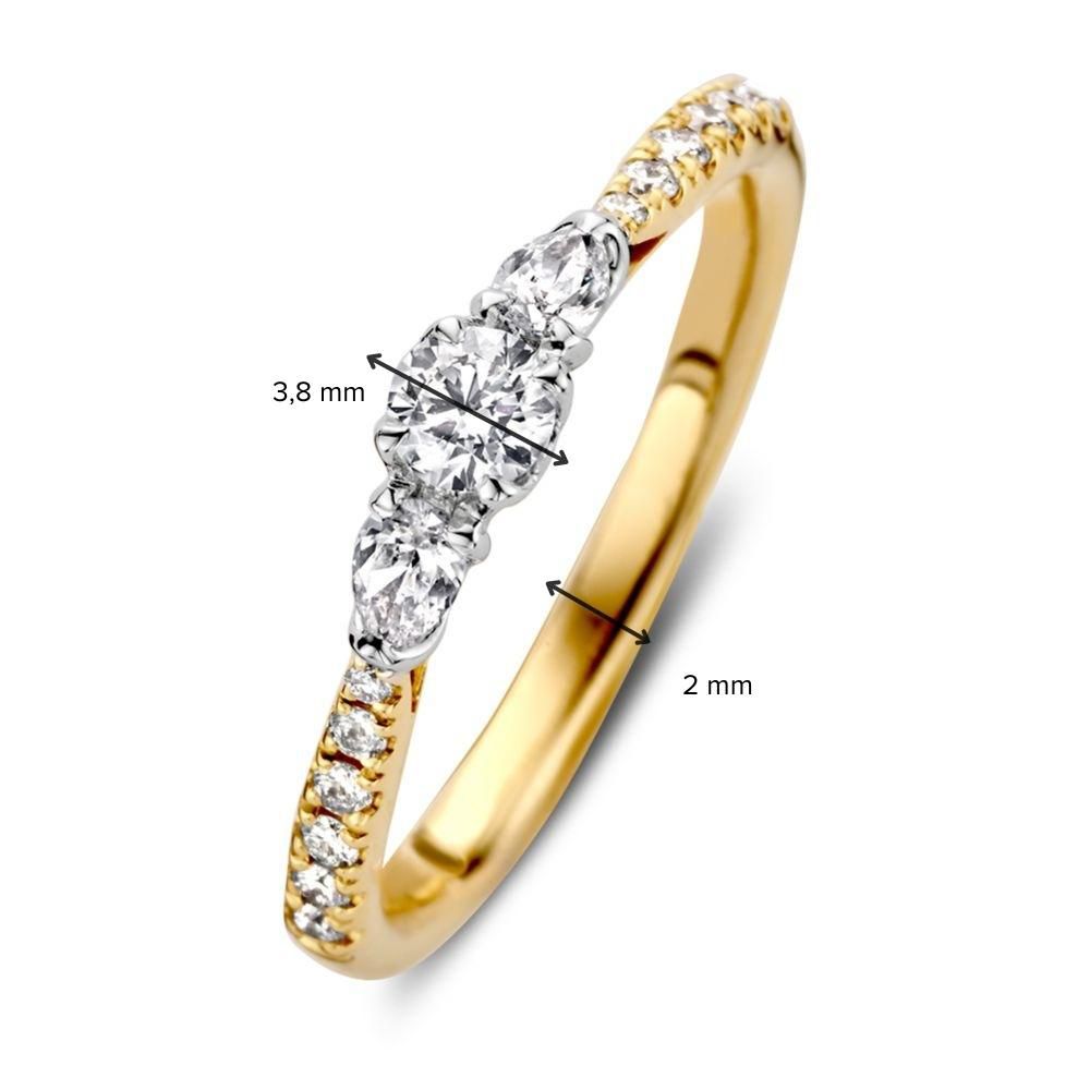 Anillo llamativo de tres piedras en bicolor oro amarillo y oro blanco con diamantes (0.51 crt)