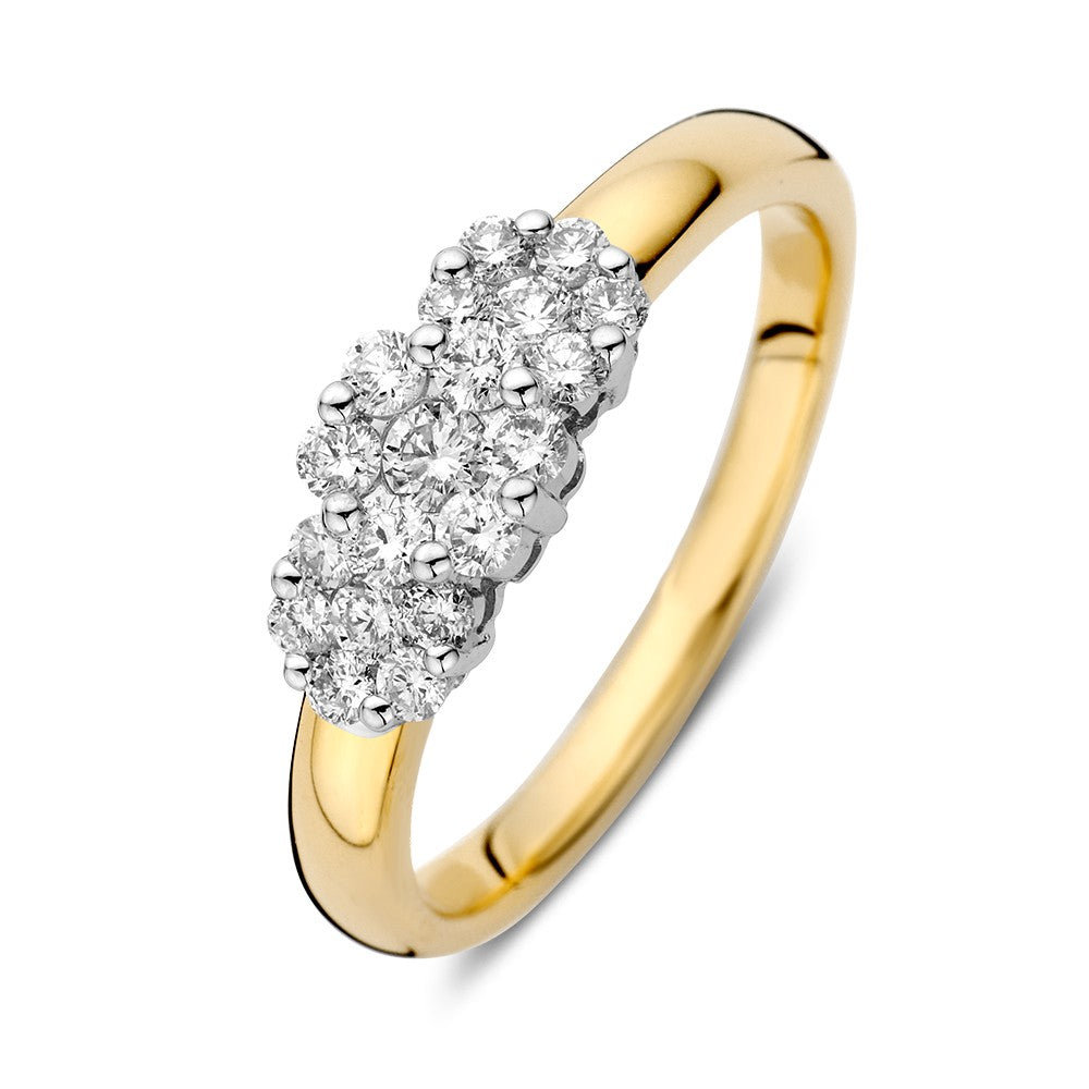 Anillo bicolor con brillantes de 0.52 ct, con parte superior plateada y banda dorada.