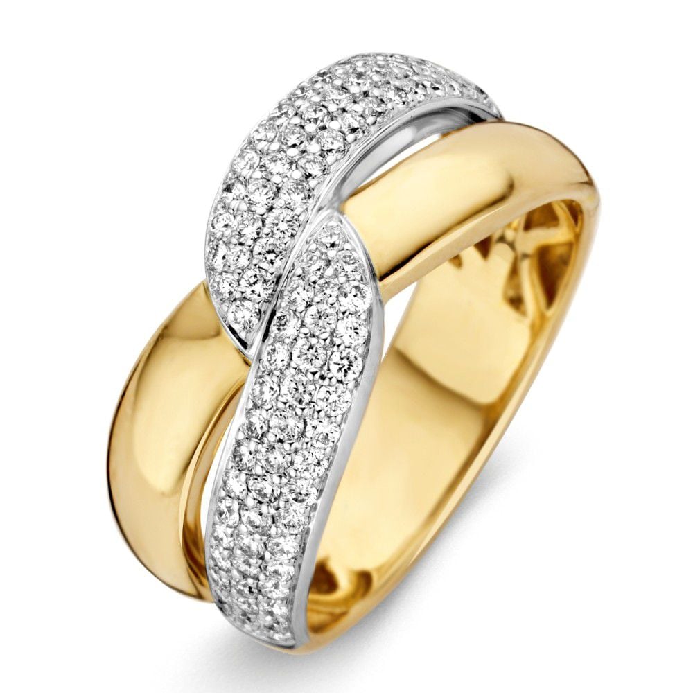 Anillo bicolor de oro amarillo y blanco con diamantes brillantes de 0.61 ct.