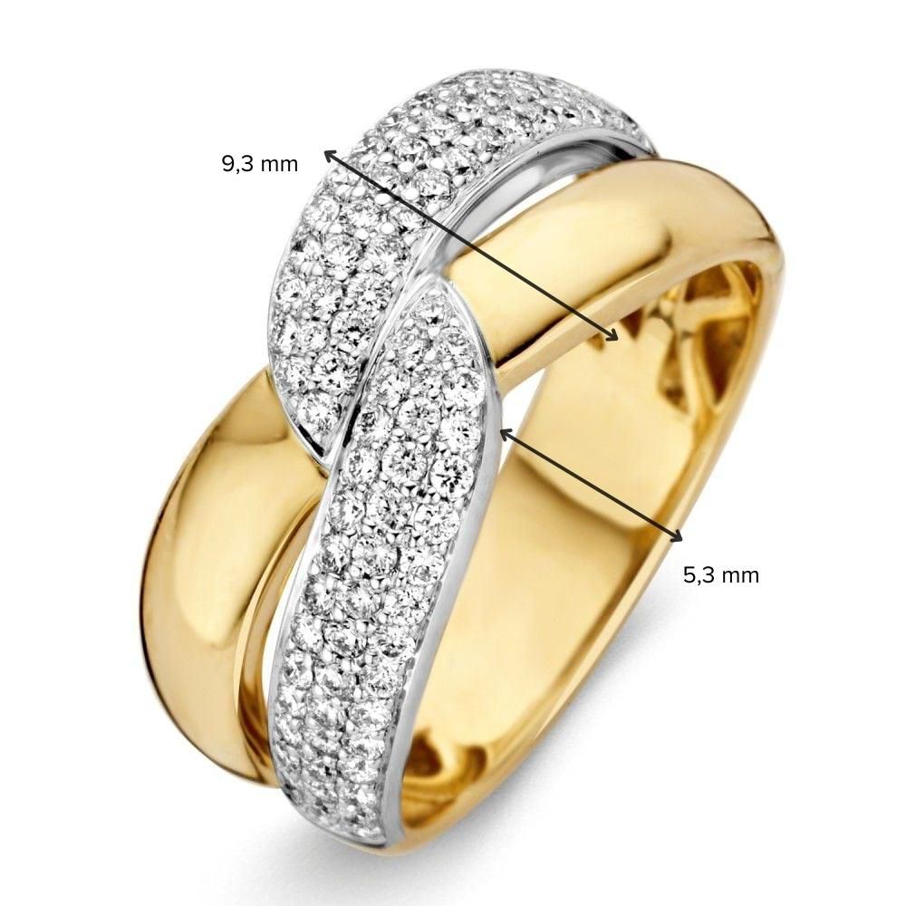 Anillo bicolor de oro amarillo y oro blanco con diamante brillante 0.61ct