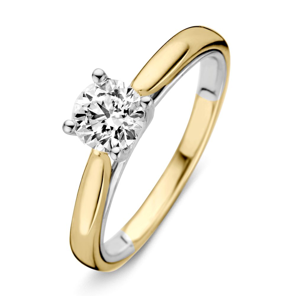 Anillo bicolor de oro amarillo y blanco con diamante brillante de 0.74ct H/SI-1 de 14 quilates.