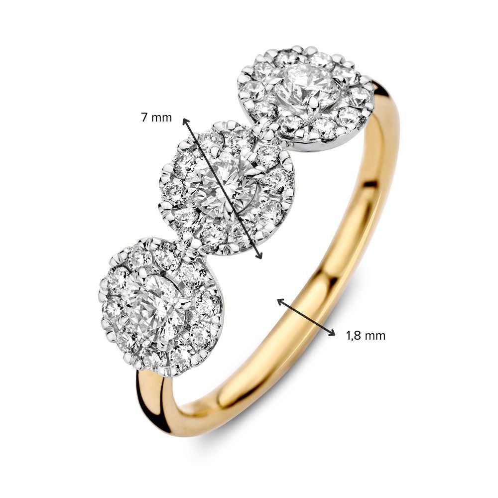 Anillo de tres piedras bicolor de oro con diamantes 0.81ct H/SI-1 14 quilates