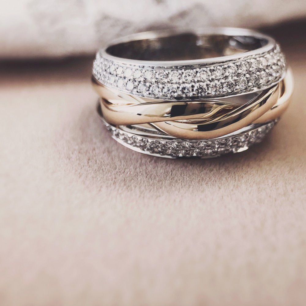 Anillo bicolor de oro con diamantes brillantes 0.87ct H/SI-1 14 quilates