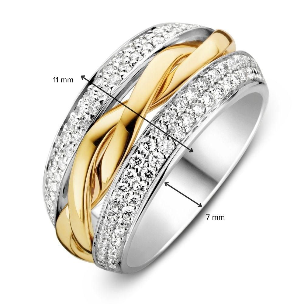 Anillo bicolor de oro con diamantes brillantes 0.87ct H/SI-1 14 quilates