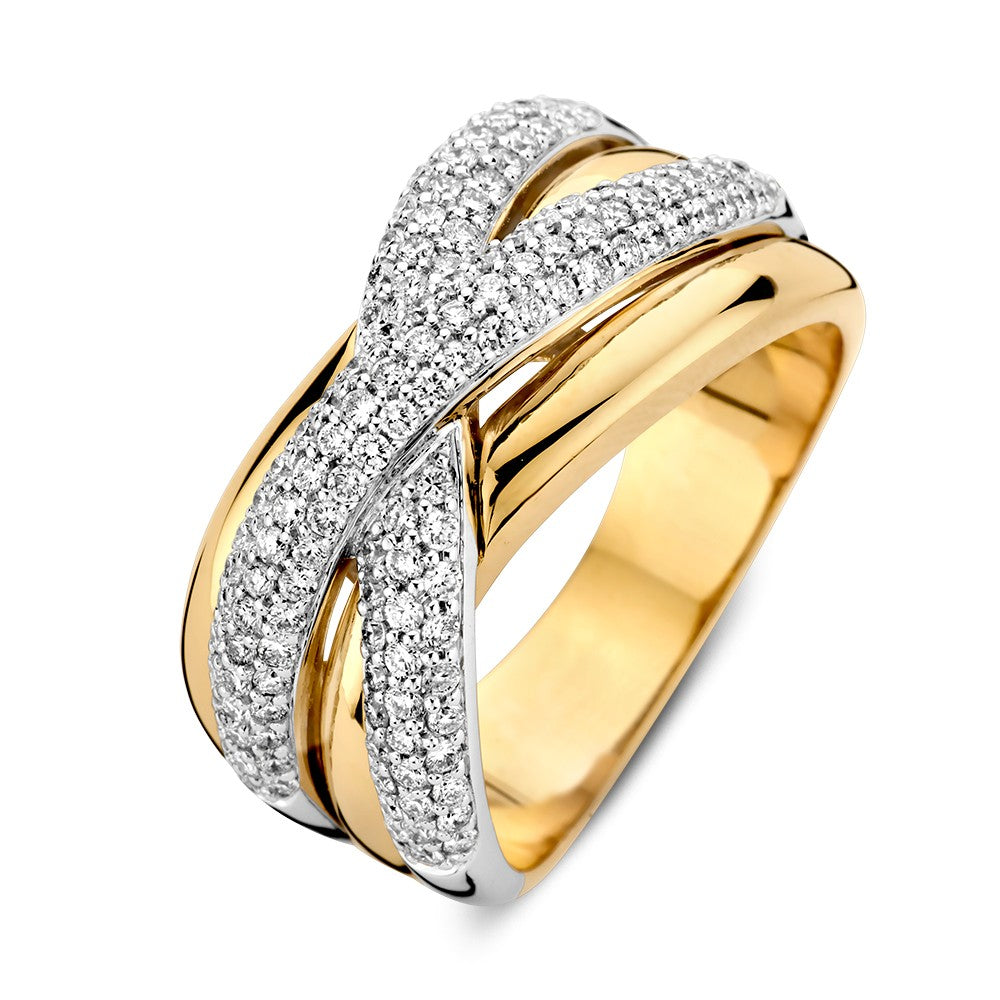 Anillo bicolor de oro blanco y amarillo con diamantes en bandas cruzadas juguetonas.