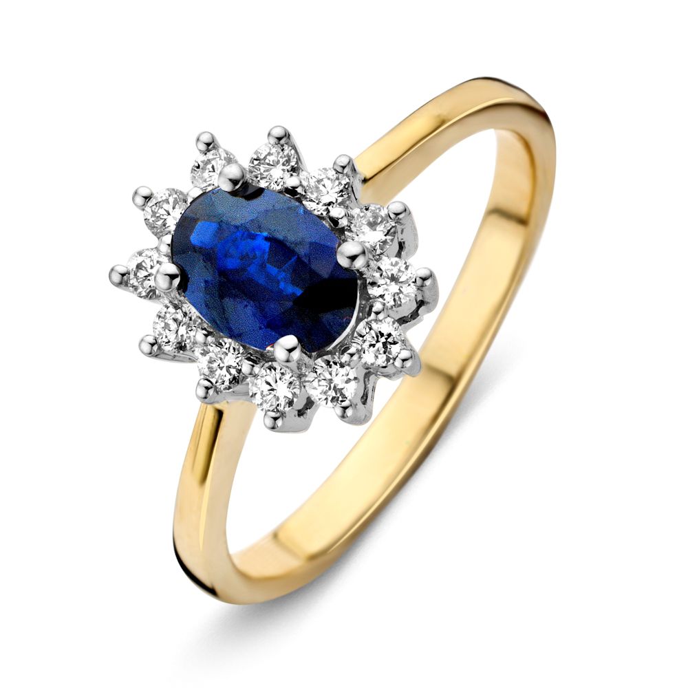 Anillo clásico de oro de 14 quilates con zafiro azul y diamantes en forma ovalada.